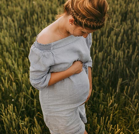 Pregnant woman starting her Catholic adoption plan